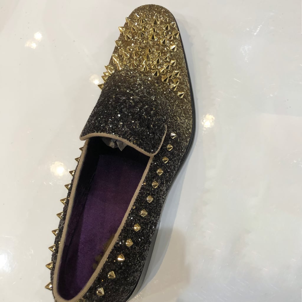 black and gold spiked shoes