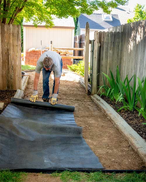 Rolling Out Planting Fabric