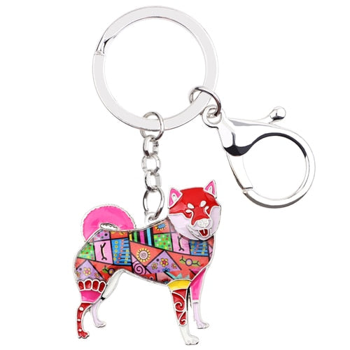 Shiba inu $745 M01199 The LV Shiba Key Holder and Bag Charm brings a  playful attitude. The adorable canine is rendered in…