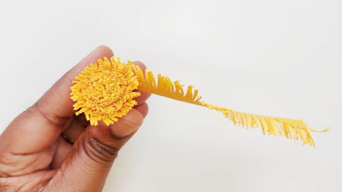 coil center with fringe paper flower