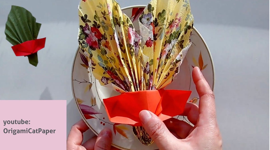 Paper napkin holders made of reused wrapping paper