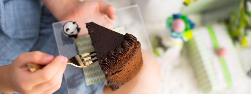 Chocolate Cake with Party-theme plate liner made of wrapping paper