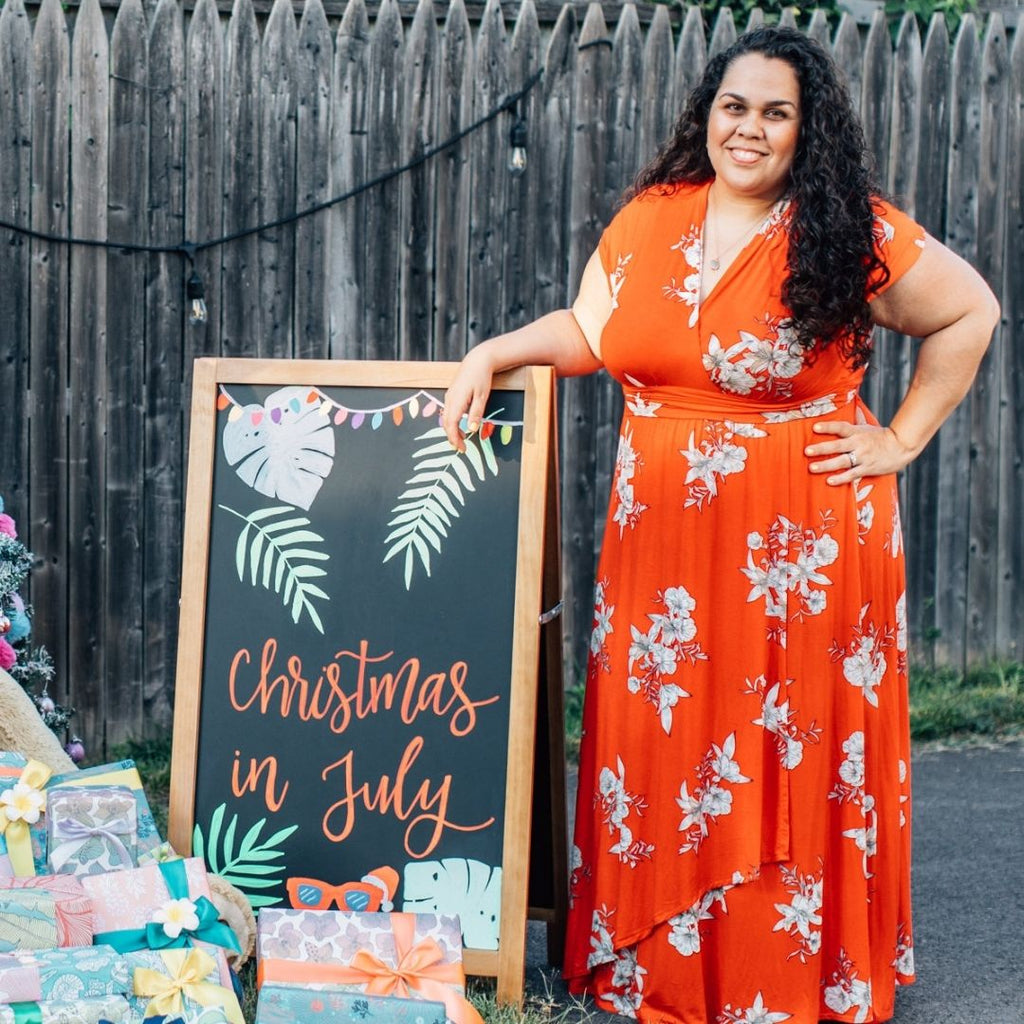 Professional Gift Wrapper, Samantha Howard of Howard and Bow with Christmas in July Sign