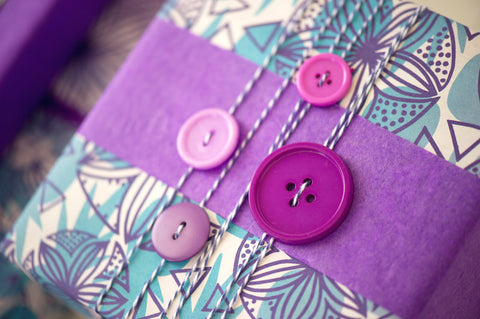 How to Gift Wrap with Buttons - Purple Buttons