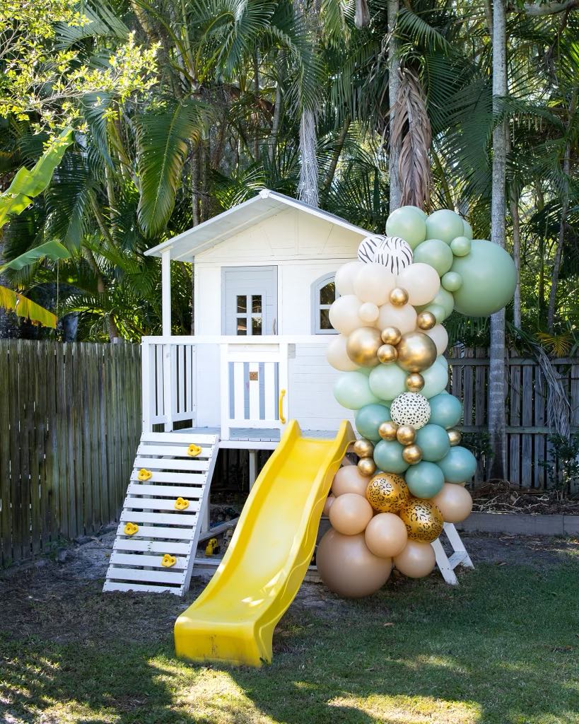 Balloon garland styled on cubby house