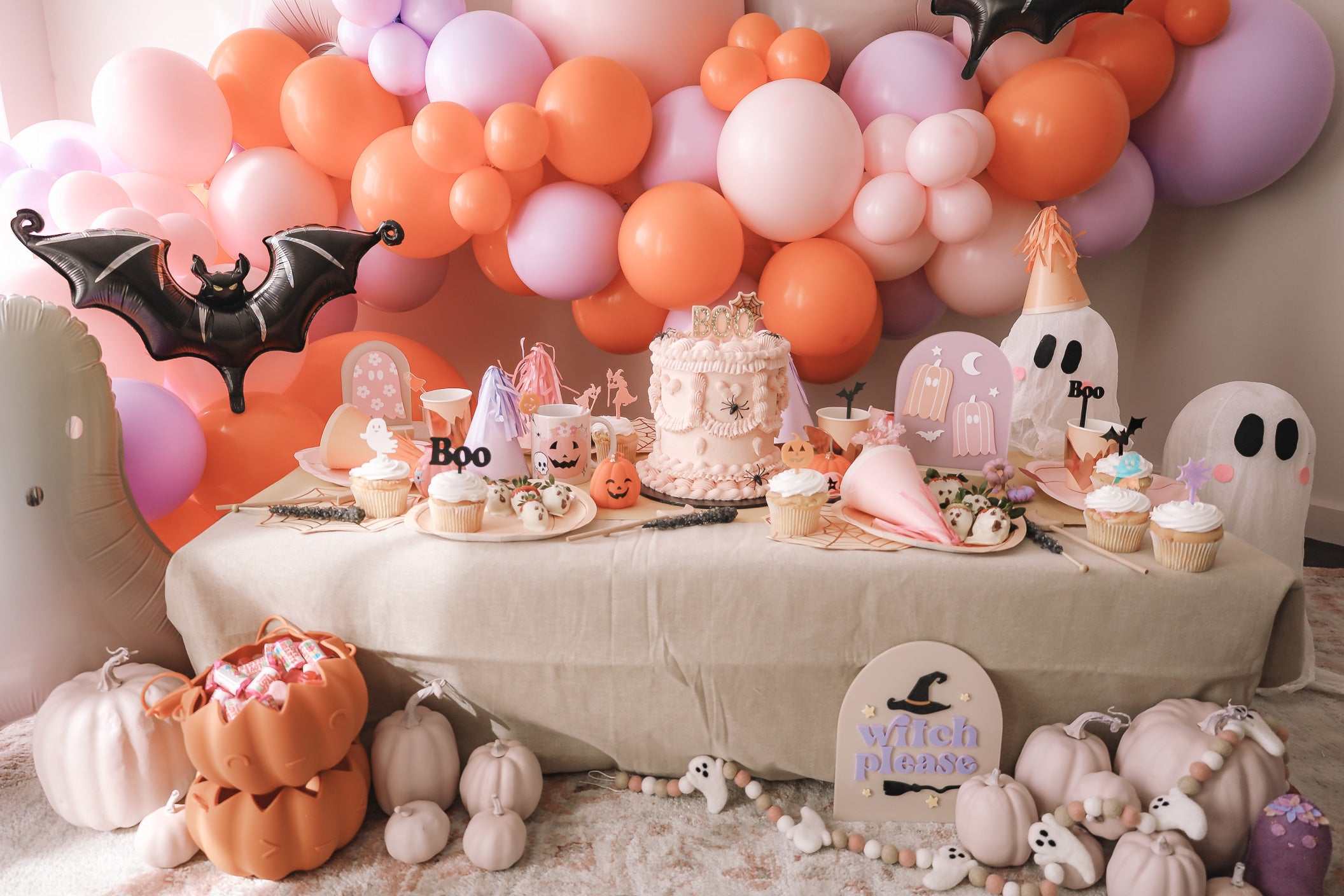 Pastel pink, lilac and orange Halloween themed party