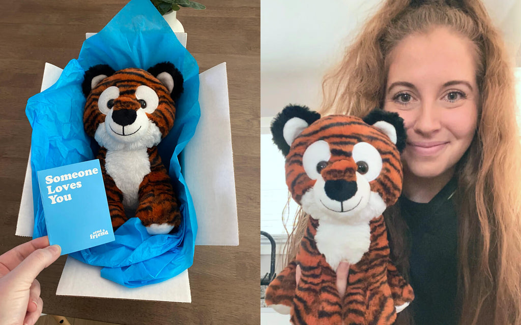 person receiving tilly the tiger care package