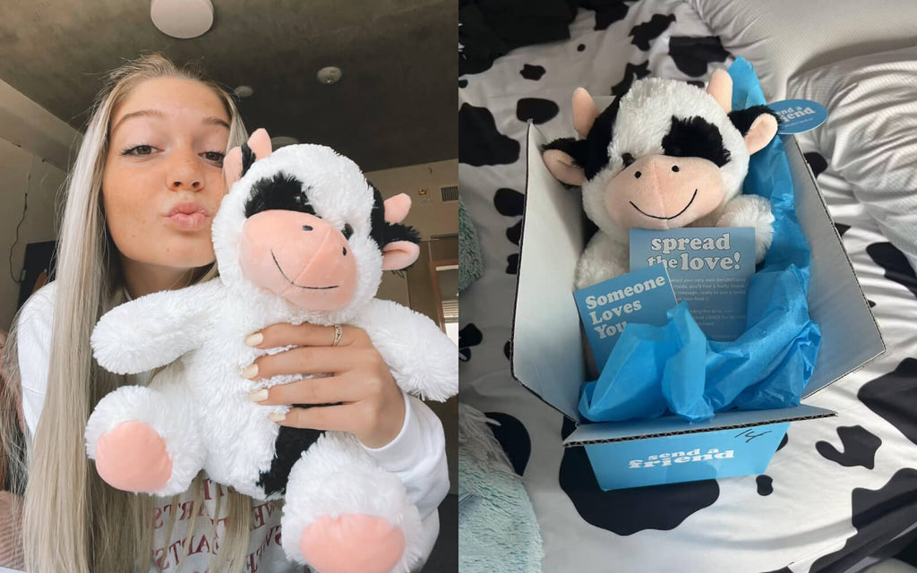 girl receiving Cooper the Cow stuffed animal care package