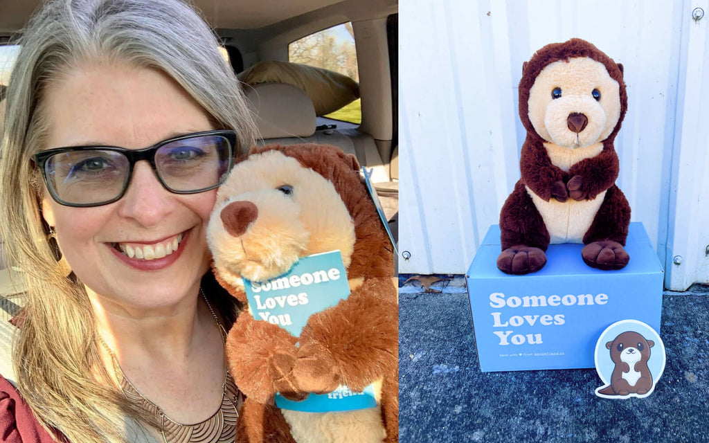 woman receiving Oliver the Otter care package