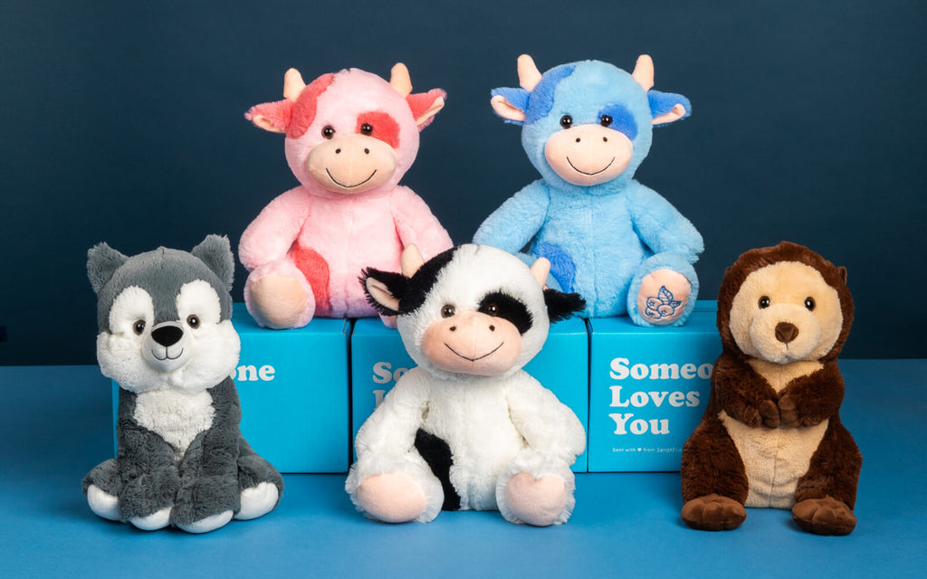 group of five stuffed animals
