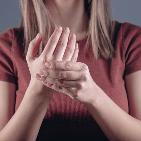woman suffering from seronegative rheumatoid arthritis