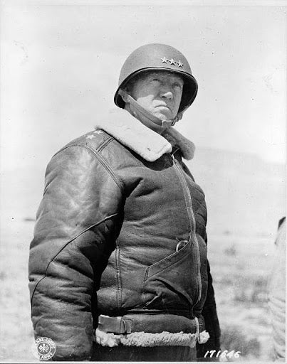 general patton wearing bomber jacket