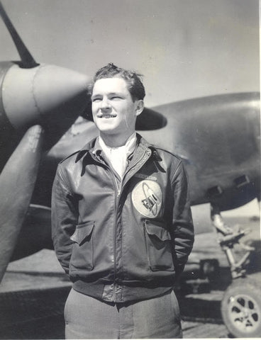 pilot wearing A2 bomber jacket.