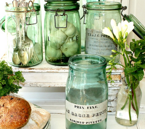Using vintage French glass jars as kitchen storage 
