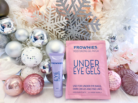 A package of Frownies Eye Cream and Frownies Under Eye Gels with Christmas Tree decorations 