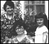 black and white family picture of young girl and her mother and grandmother