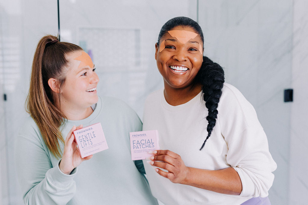 two women holding boxes of wrinkle patches