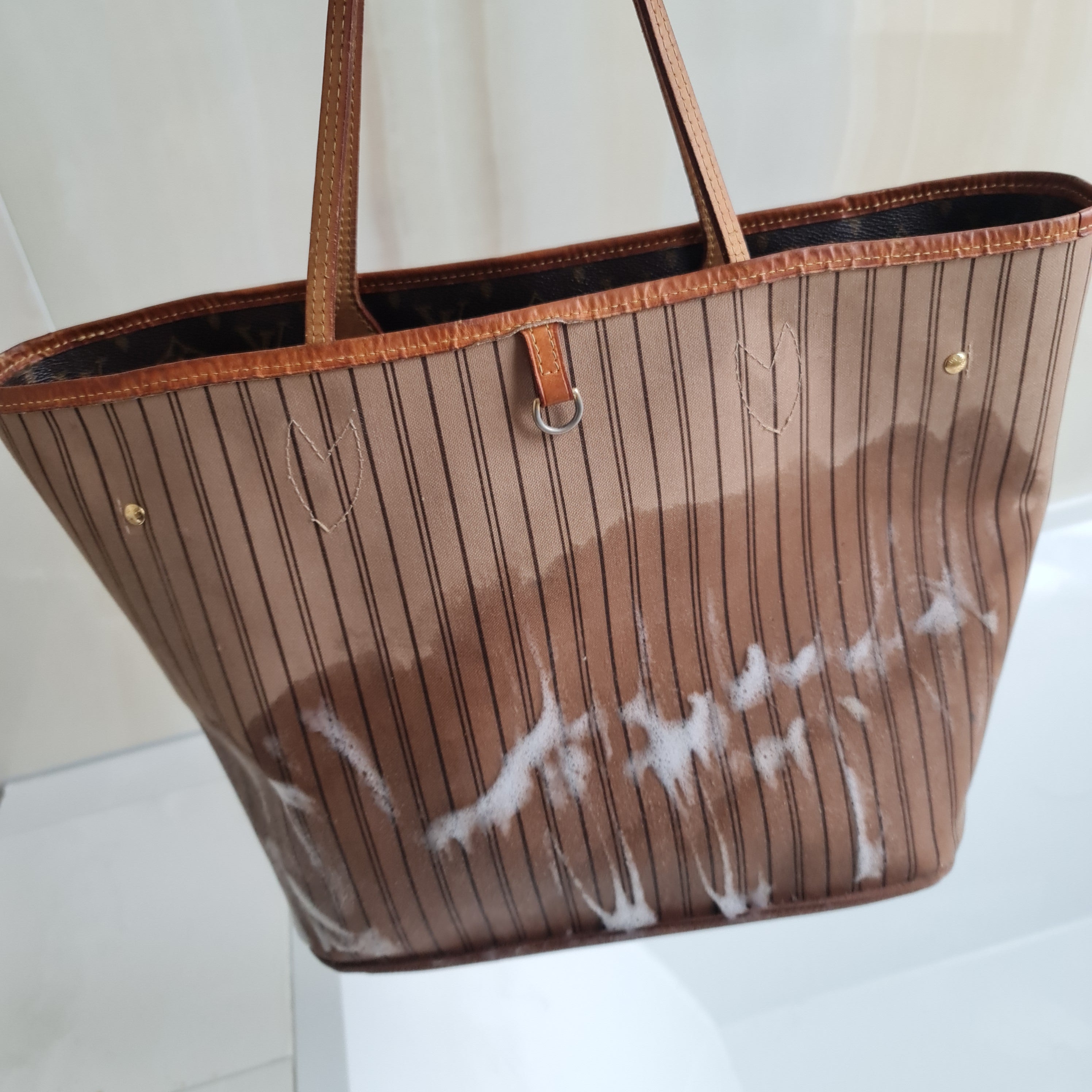 How to clean inside a Louis Vuitton bag 
