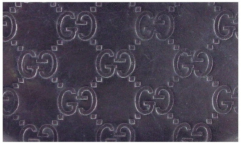 gucci guccissima pattern leather