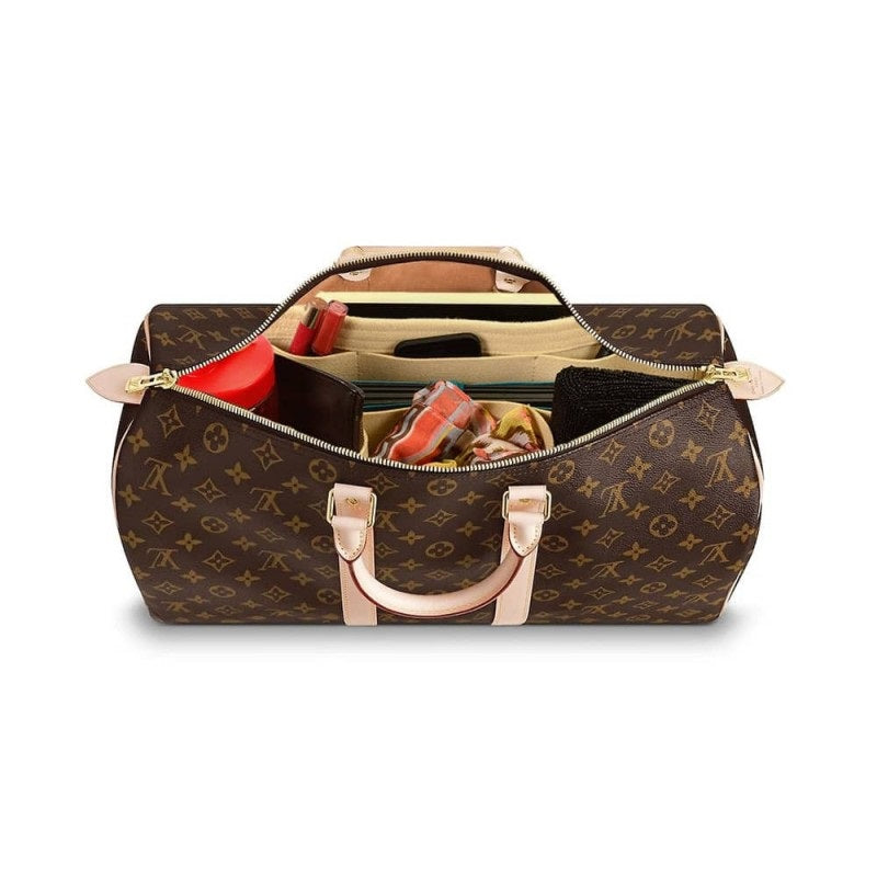 The different sizes of the Louis Vuitton Keepall – l'Étoile de Saint Honoré