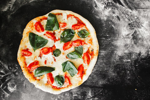 Protein Pizza simple Margherita Pizza with basil and tomatos
