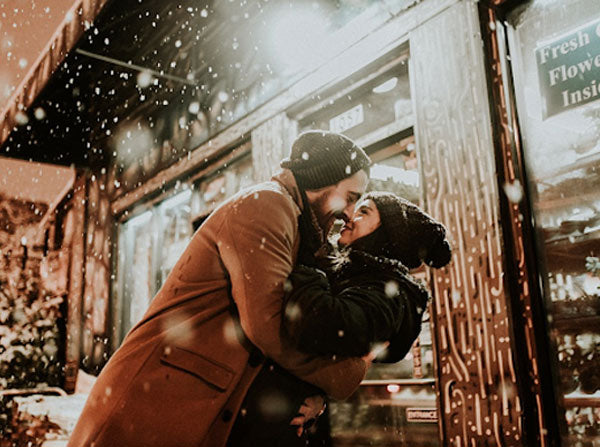 couple embracing in the snow