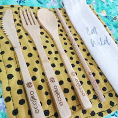 Ecojiko bamboo cutlery and reusable straw on a mustard yellow reusable napkin | Little Twidlets 