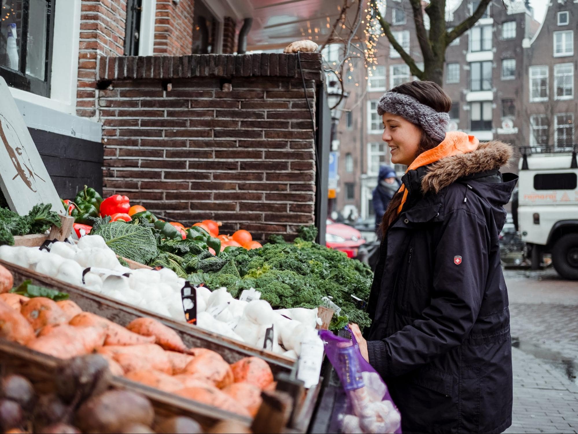 person shopping at a farmers' market