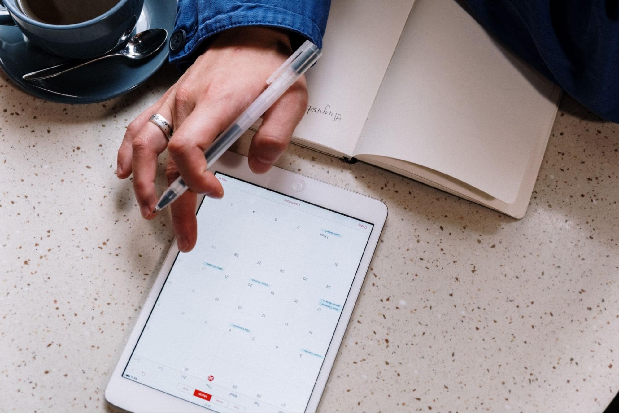 Person looking at calendar on ipad