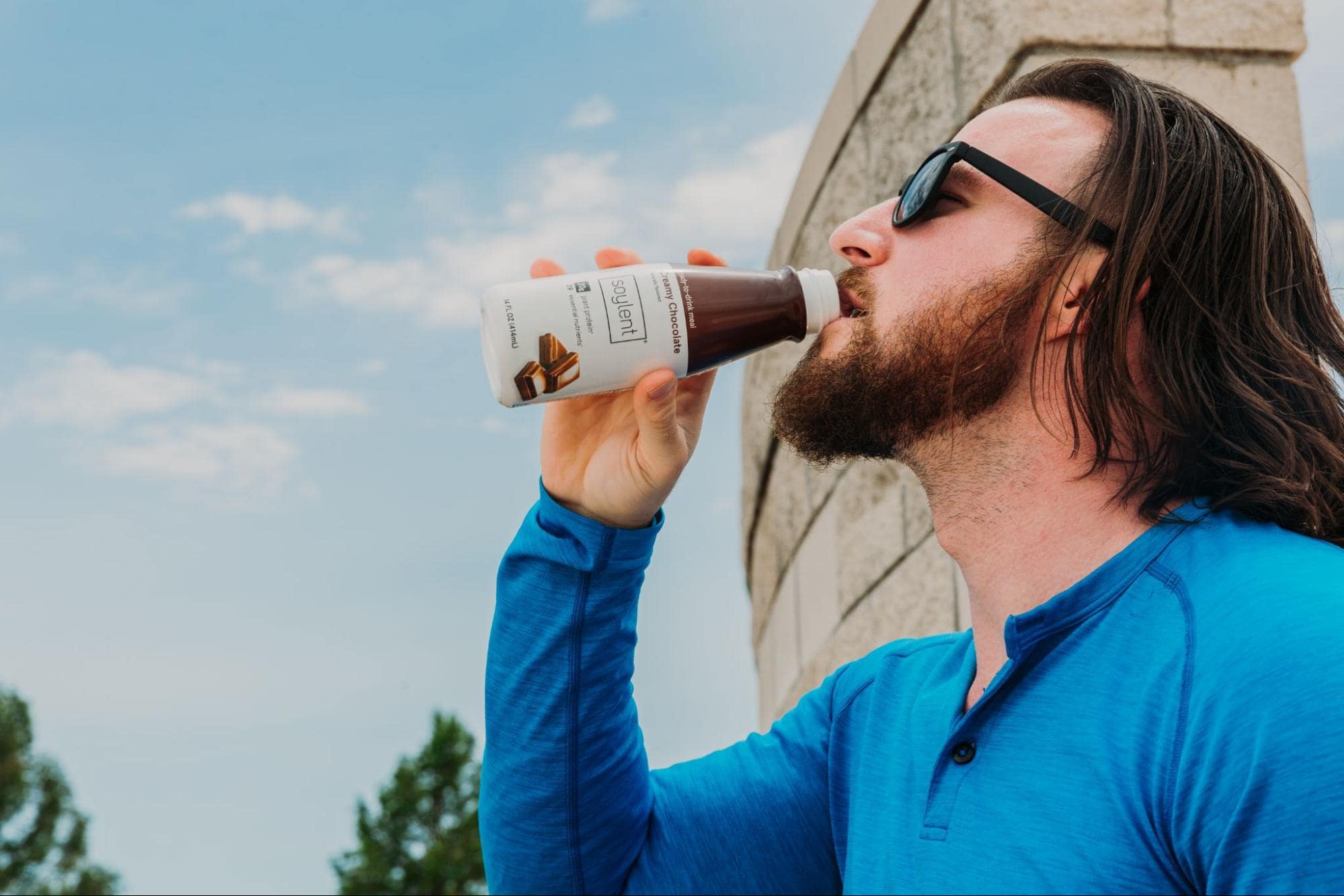 Image of person drinking Soylent