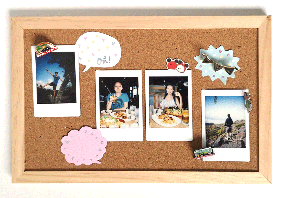 Using enamel pins and stickers to decorate photographs