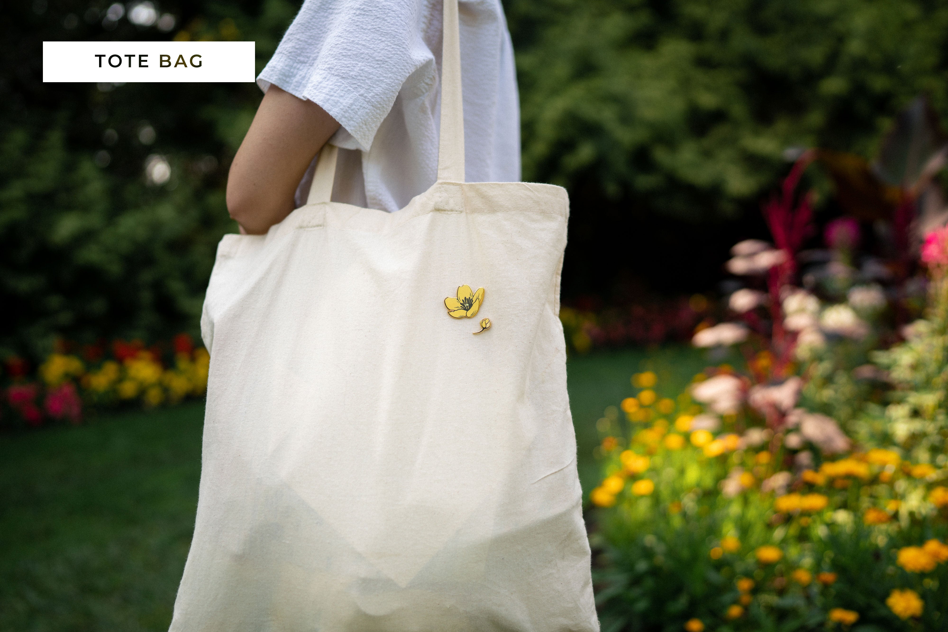 tote bag with buttercup flower pins