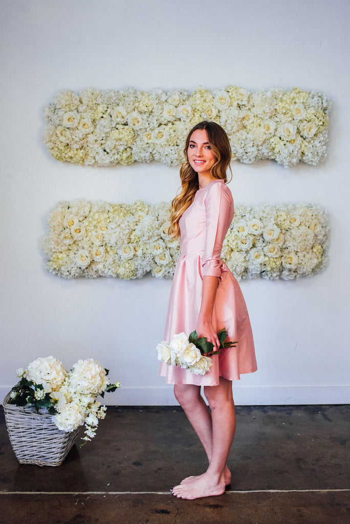 light pink fit and flare dress with sleeves