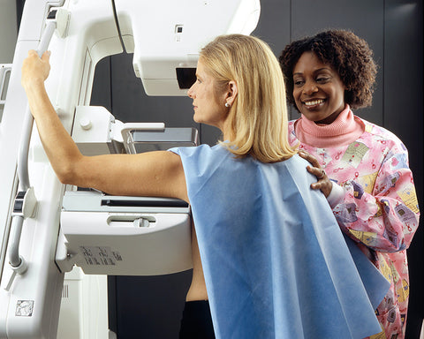 Woman getting screened for breast cancer