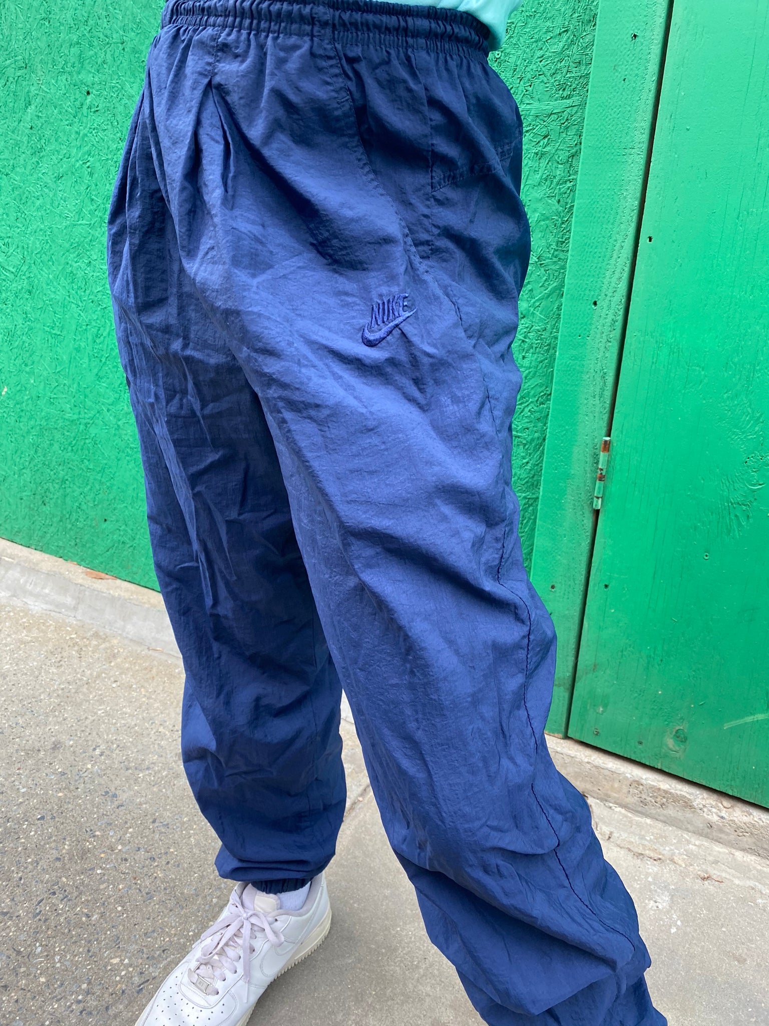 blue nike windbreaker pants