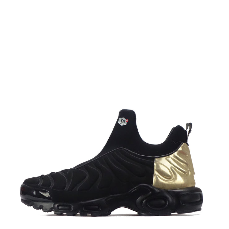 womens black and gold nike trainers