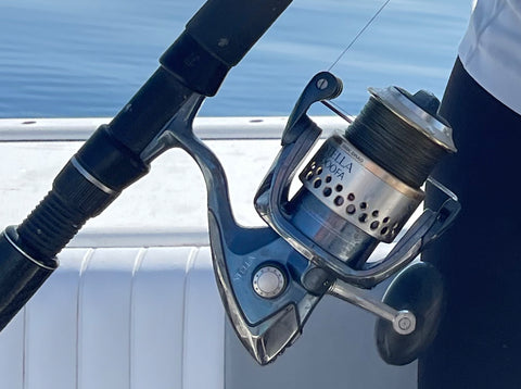 Spinning reel filled with braided fishing line