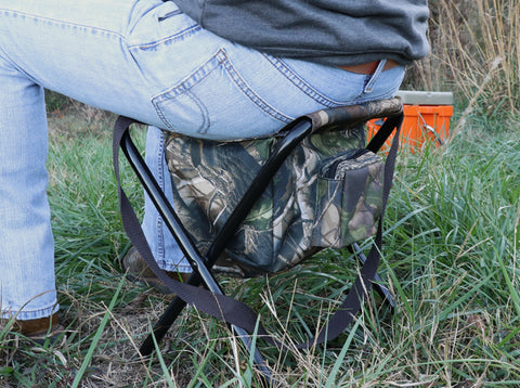 Dove hunter sitting on an HQ Outfitters Folding Stool