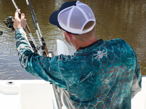 Fisherman in Calcutta Outdoors Performance Fishing Shirt