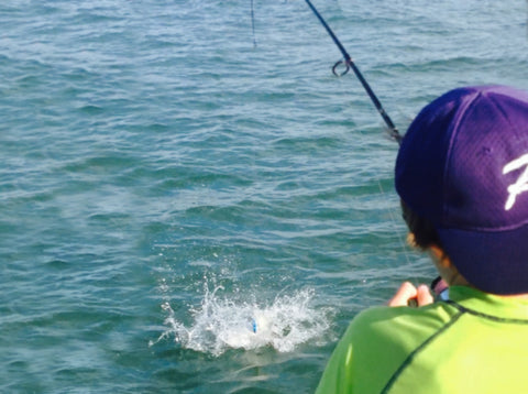 Young fisherman loses a fish