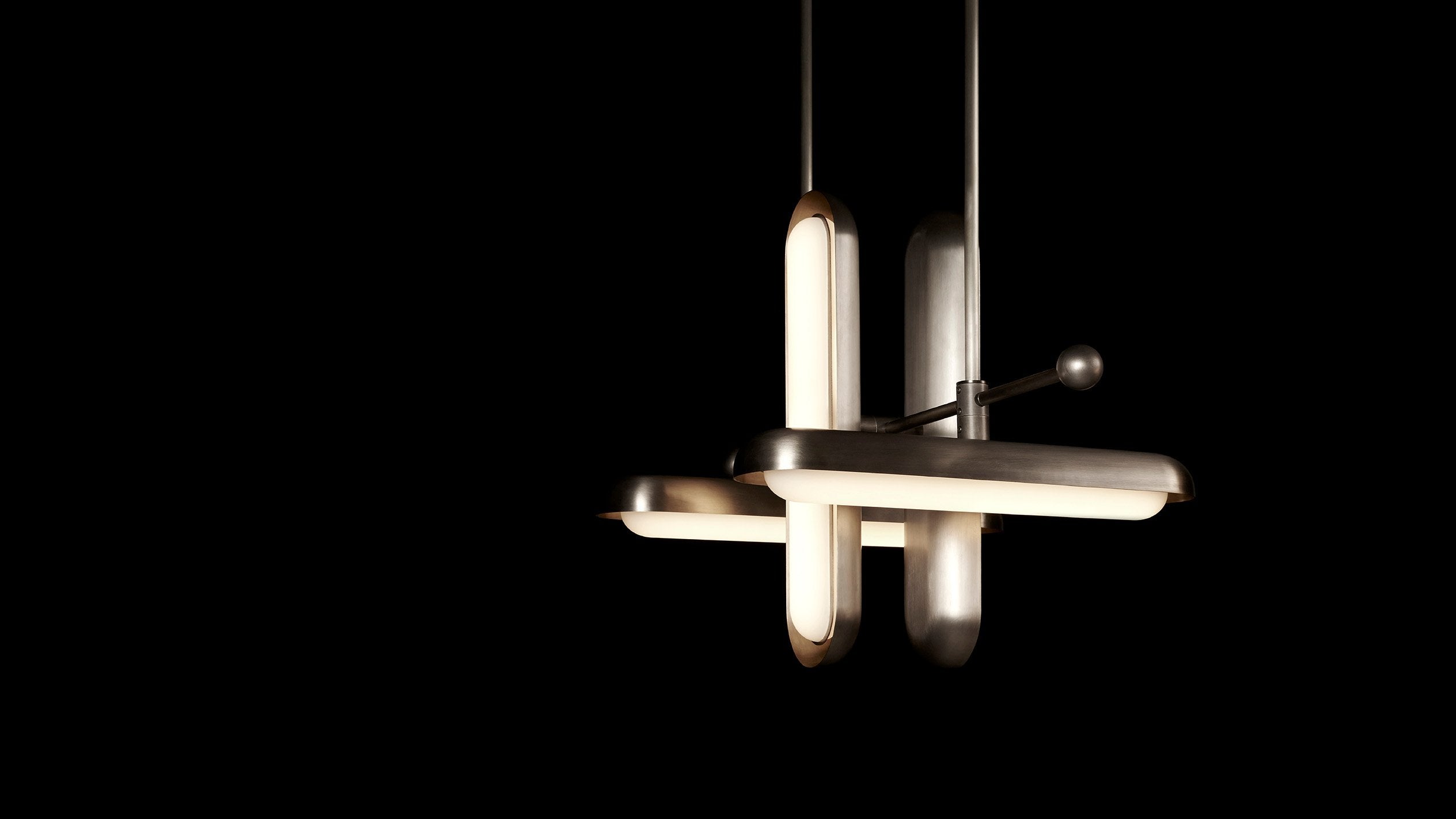 CIRCUIT : 4 alternating ceiling pendant in Tarnished Silver finish, hanging against a black background.