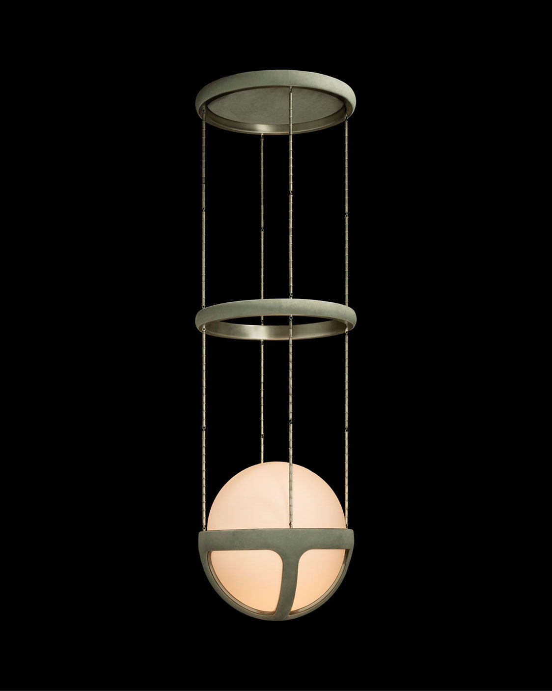 REPRISE ceiling pendant in Ice Suede and Tarnished Silver finish, hanging against a black background. 