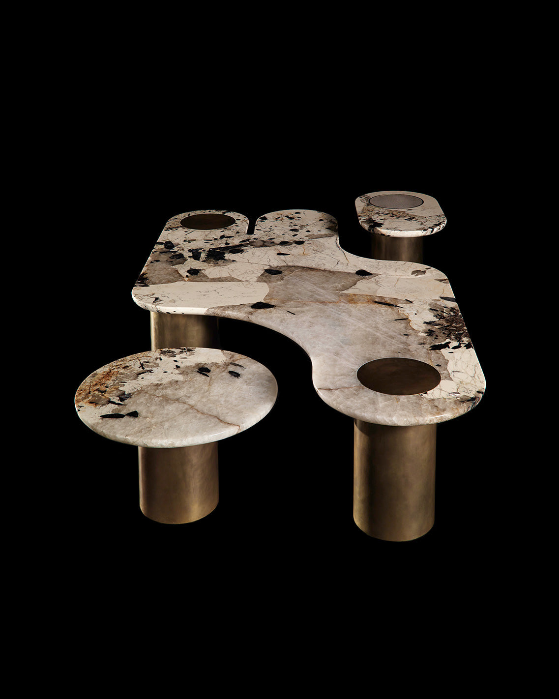 INTERLUDE marble table shown against a black background.