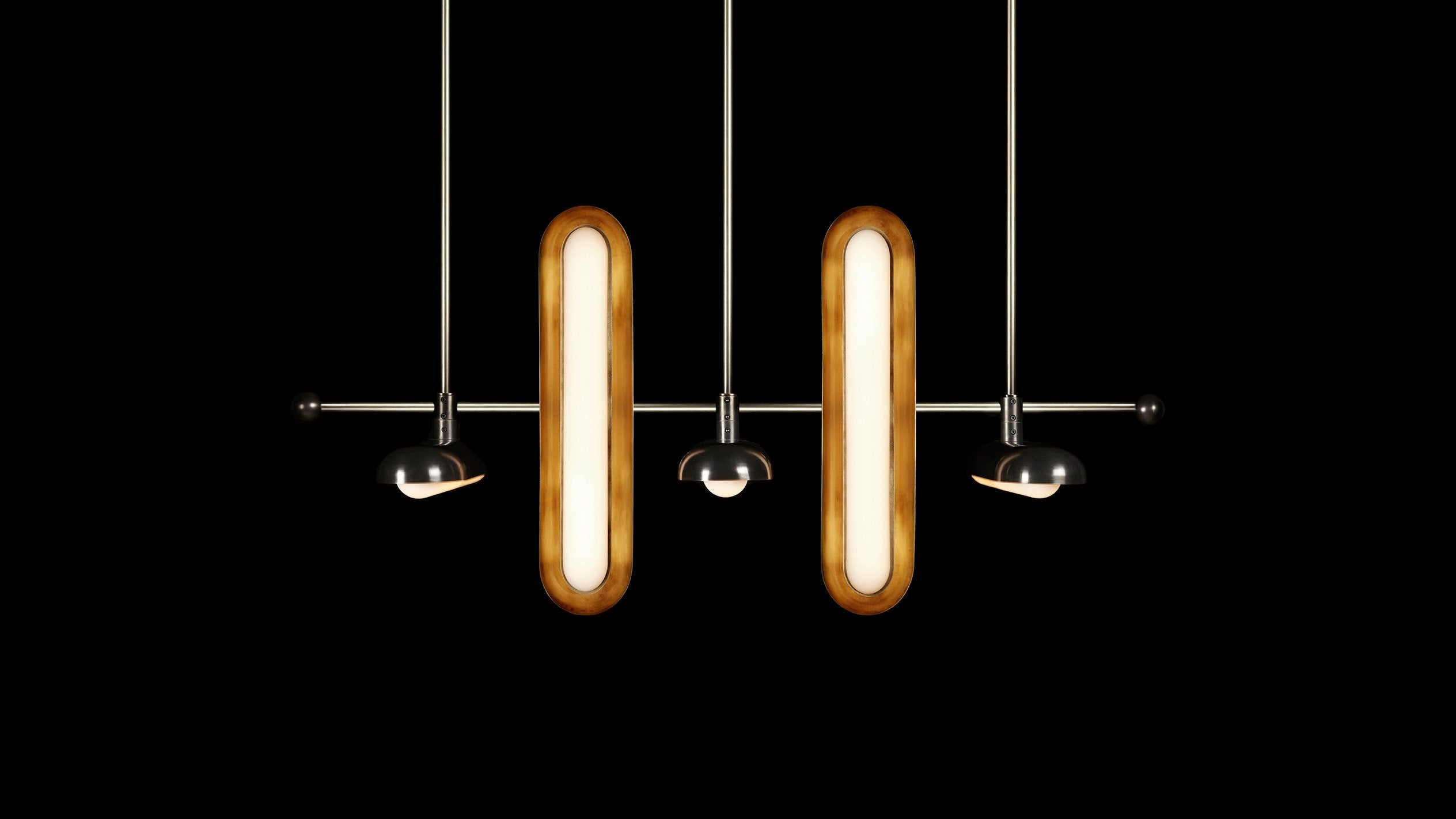 CIRCUIT : 7 ceiling pendant in two-tone finish, hanging against a black background. 