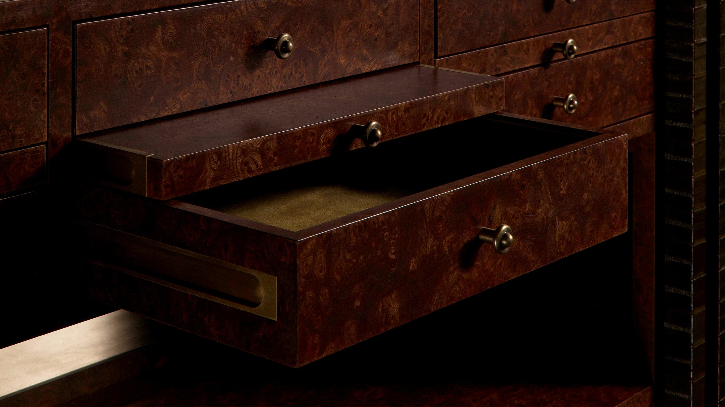 Close up of the interior drawers of the INTERLUDE cabinet. 