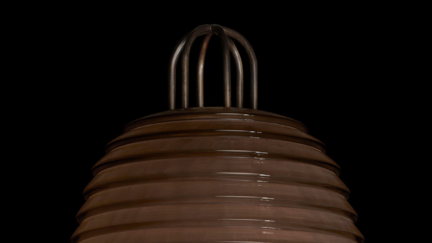 Close up of a SIGNAL : X sconce showing details of the Tarnished Silver finish and Smoked Glass.