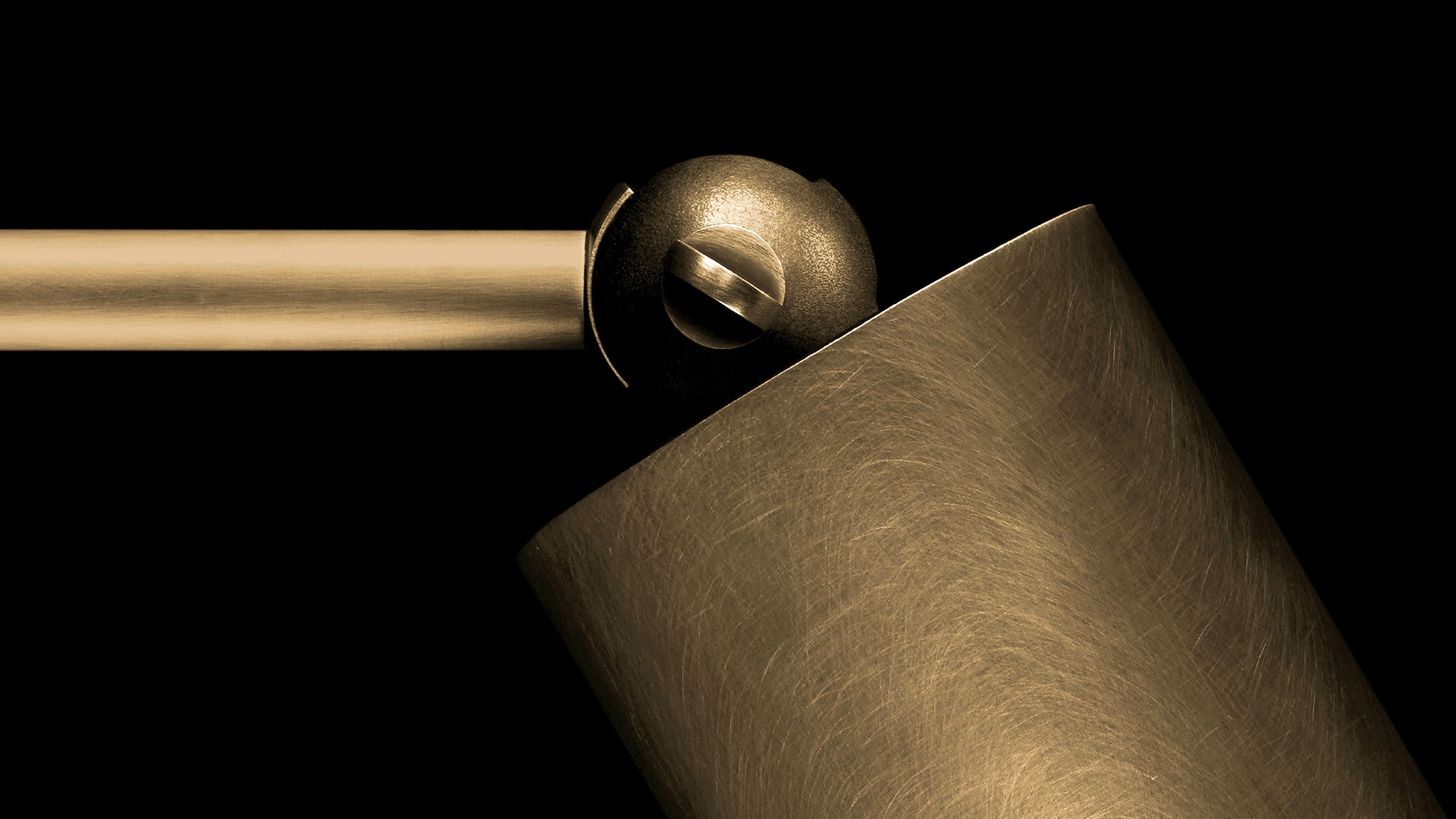 Close up of CYLINDER : SCONCE showing details of the Aged Brass finish. 