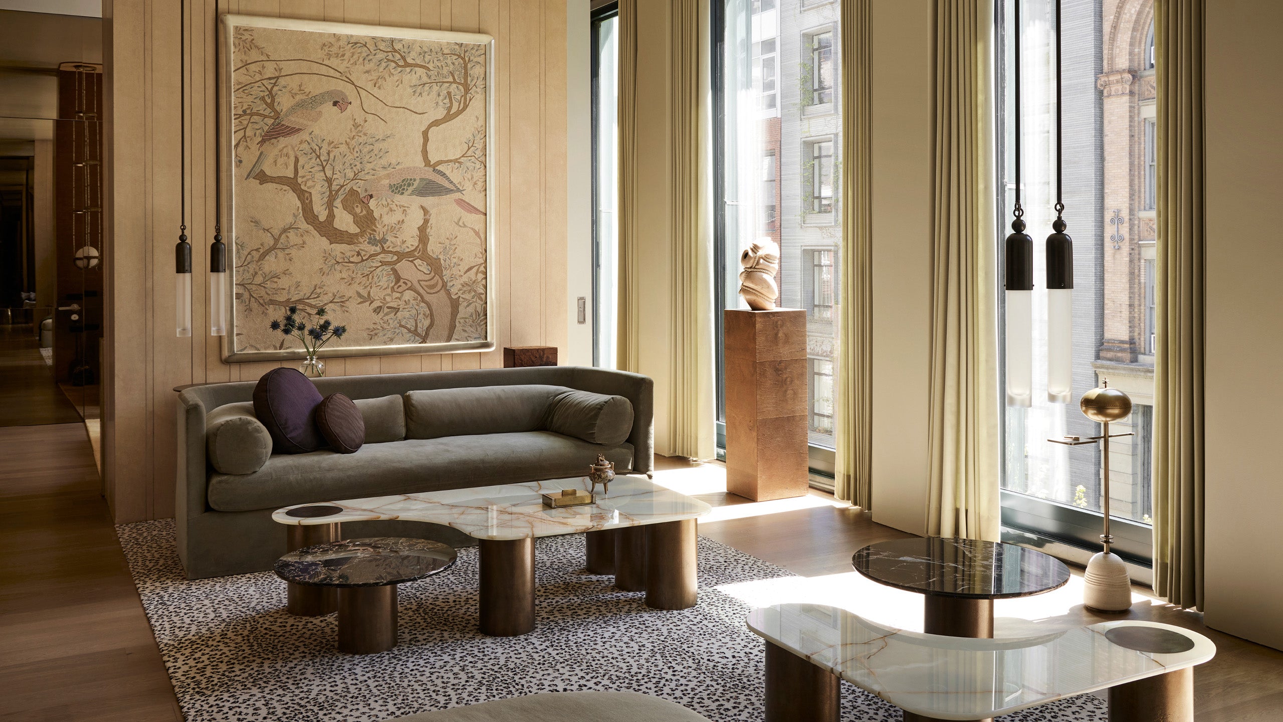 TASSEL : 1 ceiling pendants and INTERLUDE marble tables at the Bond Street residence. 