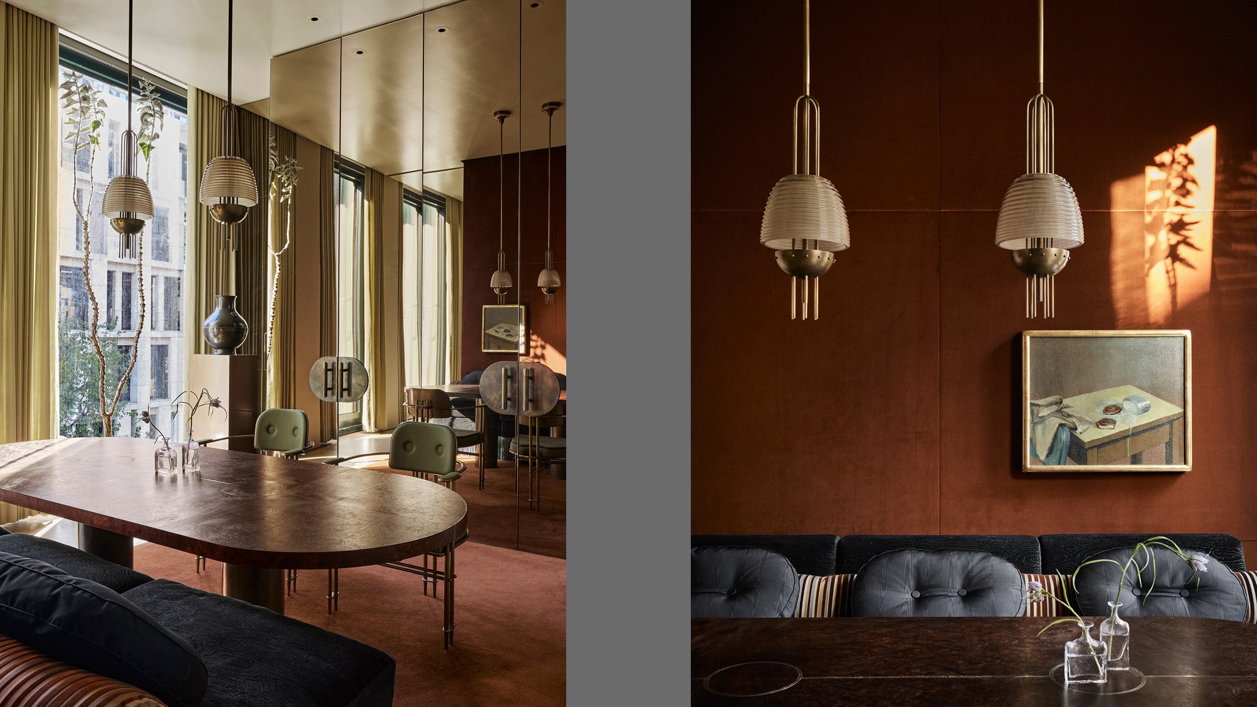 A pair of SIGNAL ceiling pendants hanging over a dining table at the Bond Street residence. 