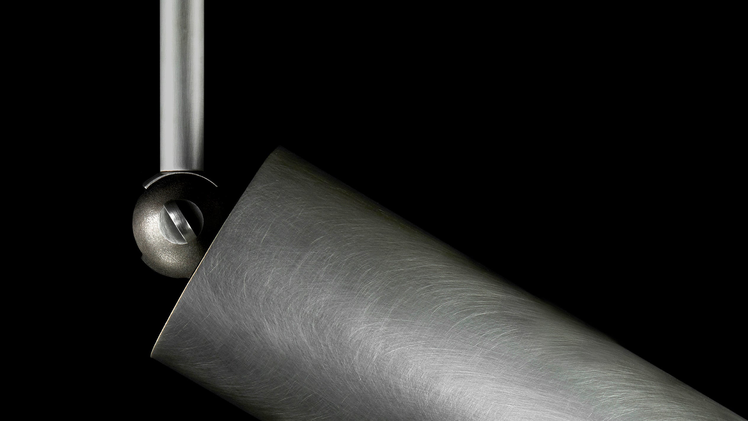 Close up of CYLINDER : DOWNLIGHT EXTENDED ceiling pendant showing details of the Tarnished Silver finish. 